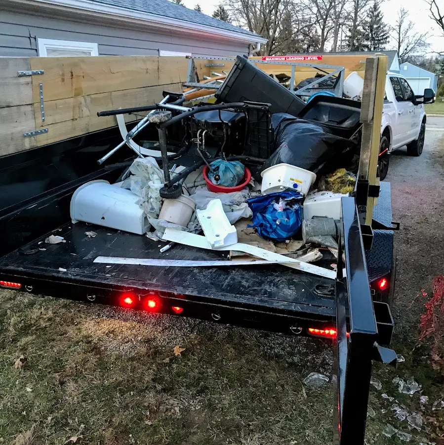 Roll-off dumpster delivered to a residential driveway in Des Plaines
